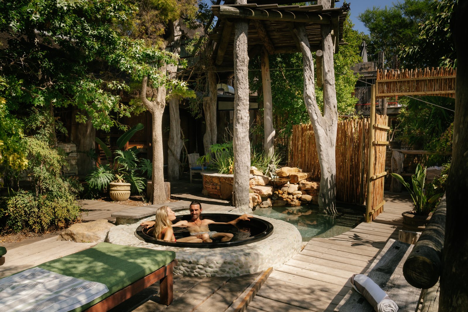 Jacuzzi deck with sun loungers at Wonderland Retreat & Spa, Hout Bay, Cape Town