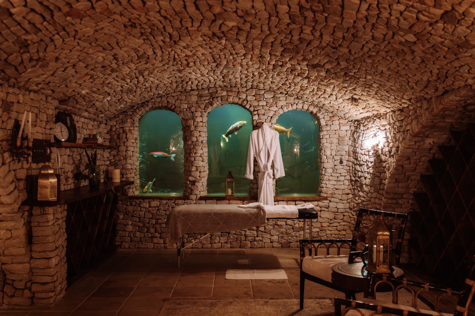 Wine cellar massage room with koi windows at Wonderland Retreat & Spa, Hout Bay, Cape Town